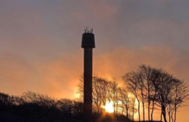 Billede af Cloostårnet lige inden solen går ned
